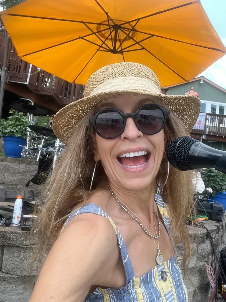 Baibi selfie at the mic at an outdoor private party – Isle Island Bash