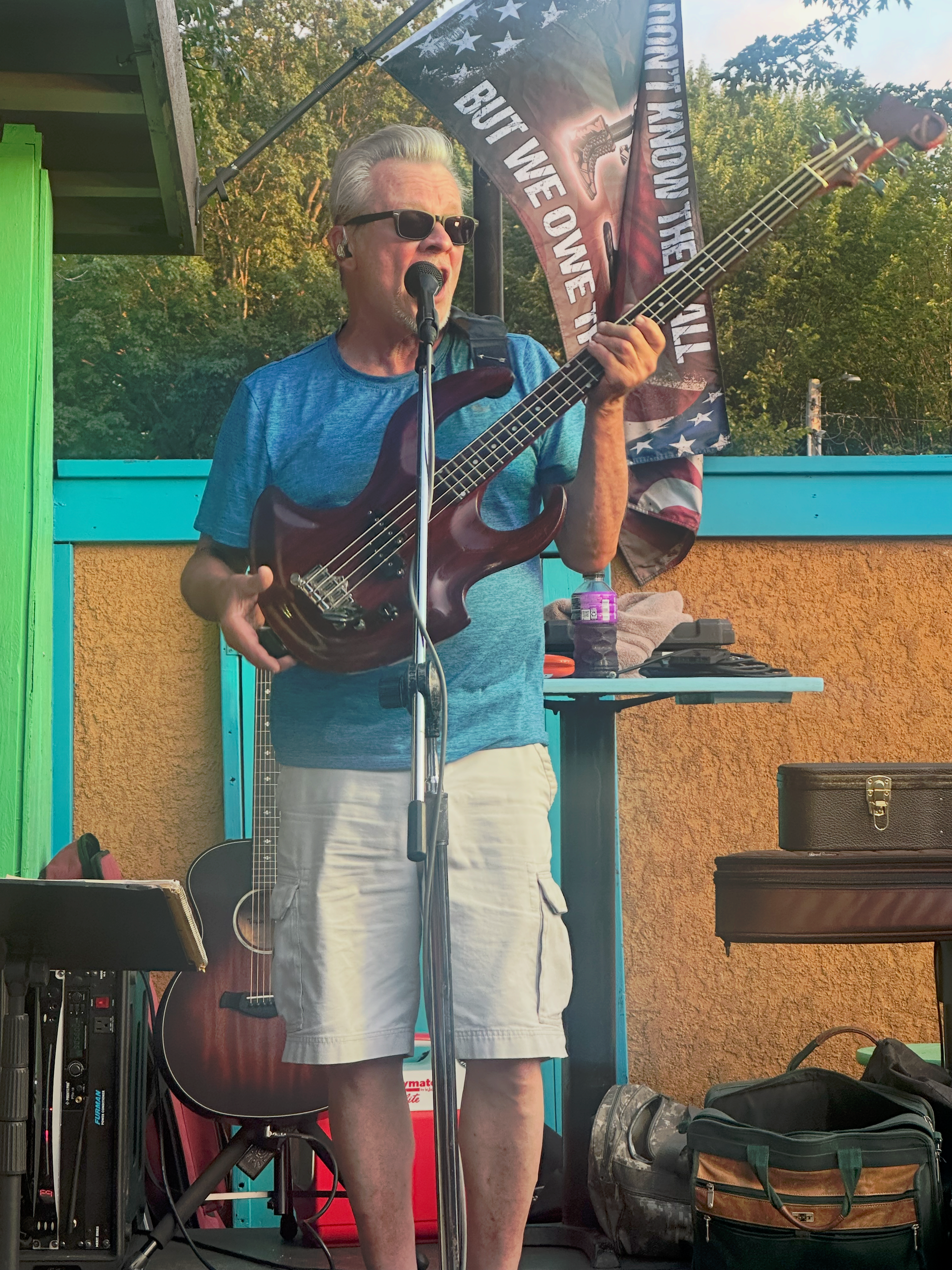 Flying Train Wreck bassist performing outdoors